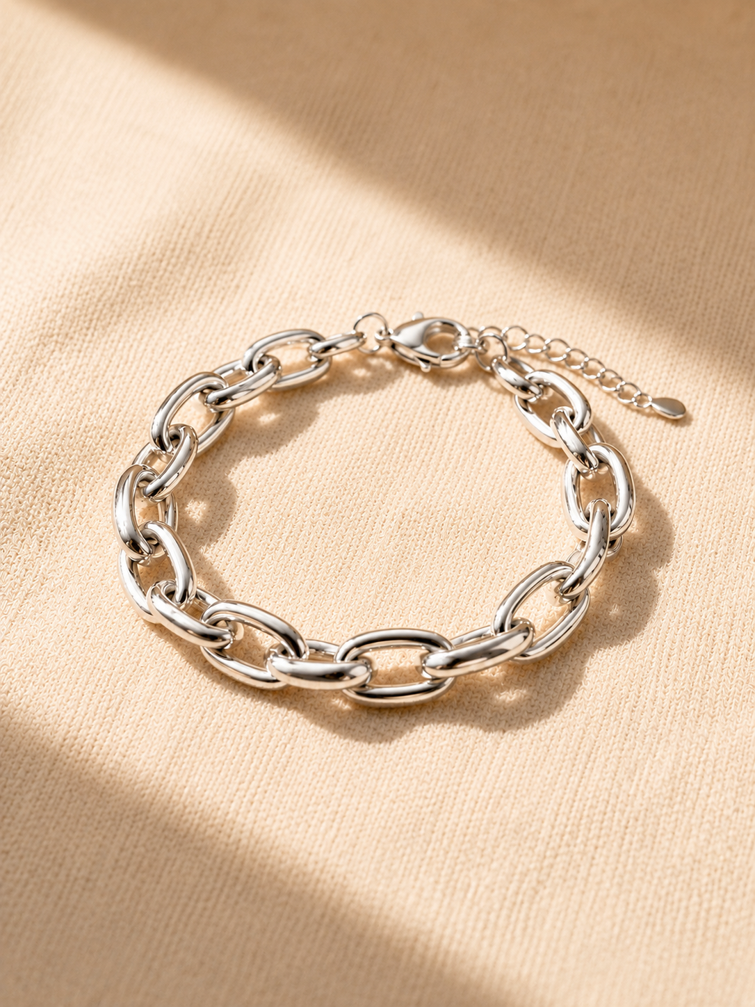 Oval-link bracelet — plated, polished