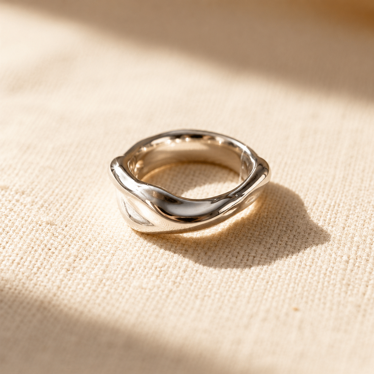 Sculpted band — plated, brass core