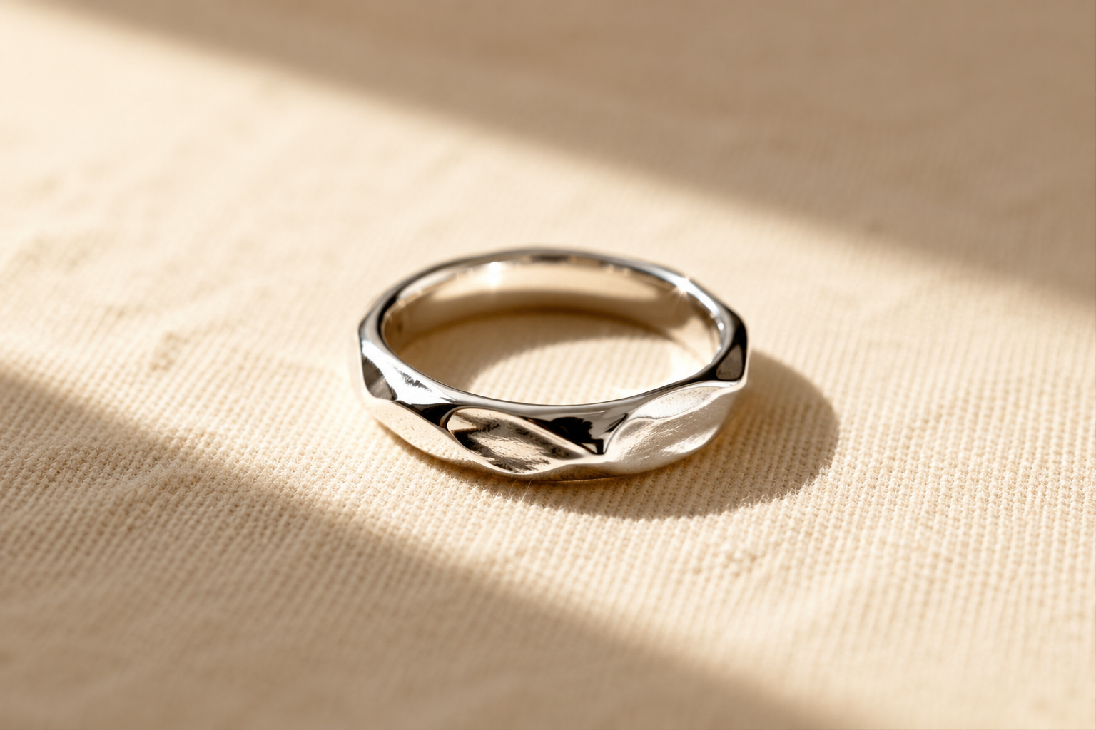 Faceted band — polished sterling silver